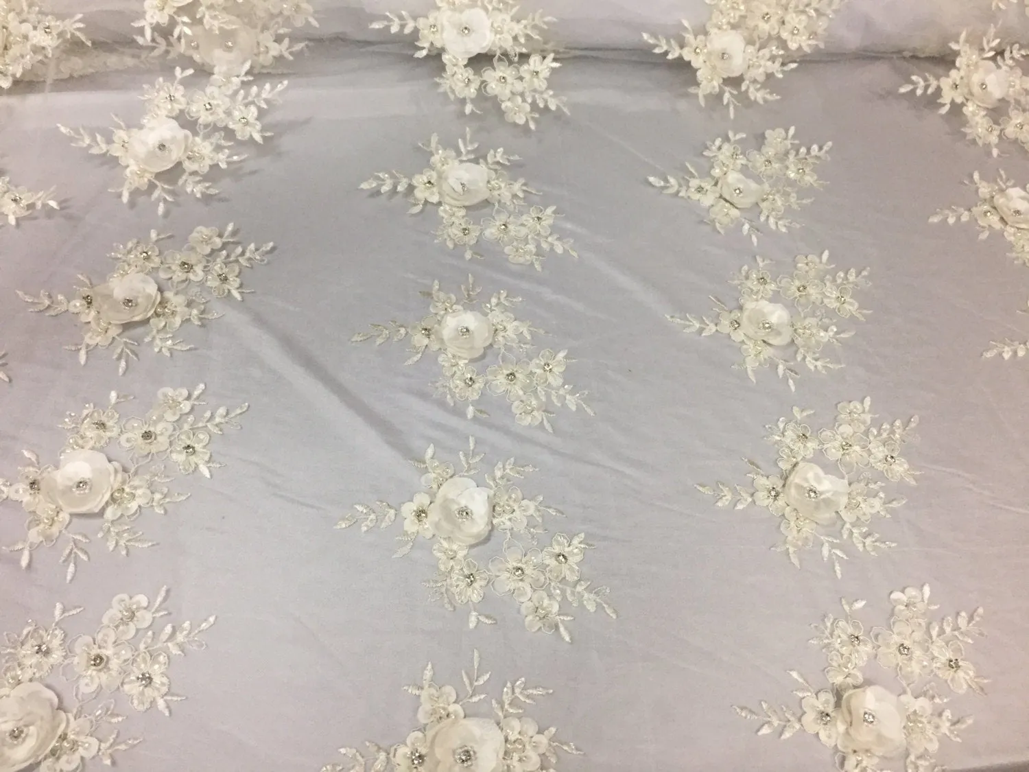 Lavish Ivory 3D flowers embroider and beaded on a mesh lace -Sold by the yard